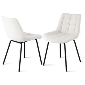 Pair of Artiss Velvet Tufted Dining Chairs Beige arranged symmetrically next to a modern wooden kitchen table.