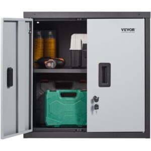 Black expandable foldable wall cabinet mounted on a garage brick wall holding power tools.